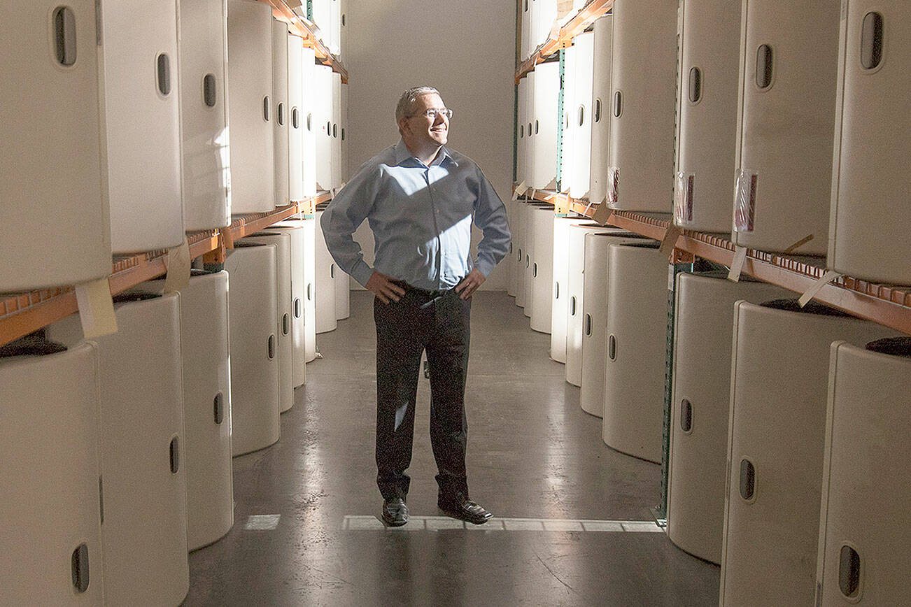 Commercial Aircraft Interiors General Manager James Barnett stands in a warehouse aisle of 777 overhead bins at the company's new building on Monday, May 20, 2019 in Arlington, Wash. (Andy Bronson / The Herald)
