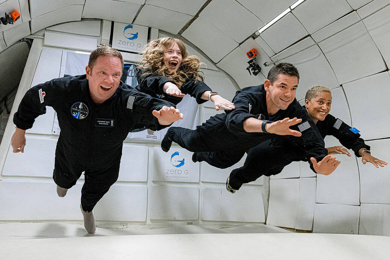 The crew of the Inspiration4 orbital mission of SpaceX during airborne training in zero gravity, from left: Chris Sembroski of Everett, Hayley Arceneaux of Memphis, Tennessee, Jared Isaacman of Washington, New Jersey, and Sian Proctor of Phoenix. (SpaceX) 20210913