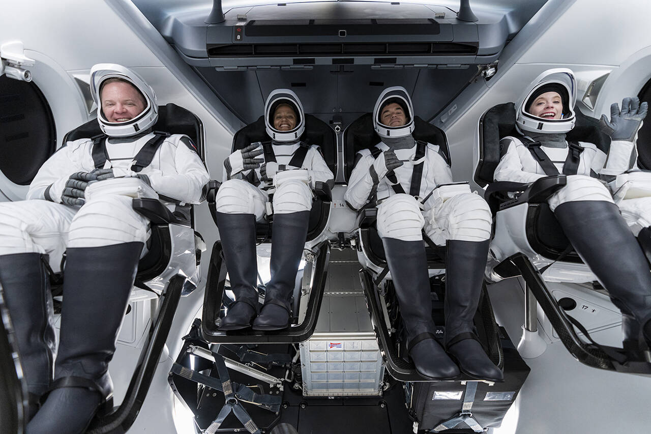 In this Sept. 12 photo, from left, Chris Sembroski, Sian Proctor, Jared Isaacman and Hayley Arceneaux sit in the Dragon capsule at Cape Canaveral in Florida, during a dress rehearsal for Wednesday’s launch. (SpaceX via AP)