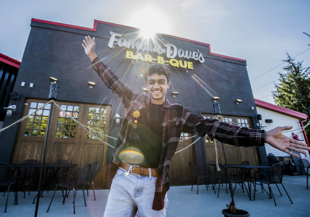 Evan Wiederspohn, a 15-year-old from Arlington, won the blind-judging Put It On The Menu category in a recent BBQ contest hosted by Famous Dave’s. His bacon-wrapped mac and cheese bites with burned BBQ ends will go on the appetizer menu in November. (Olivia Vanni / The Herald)
