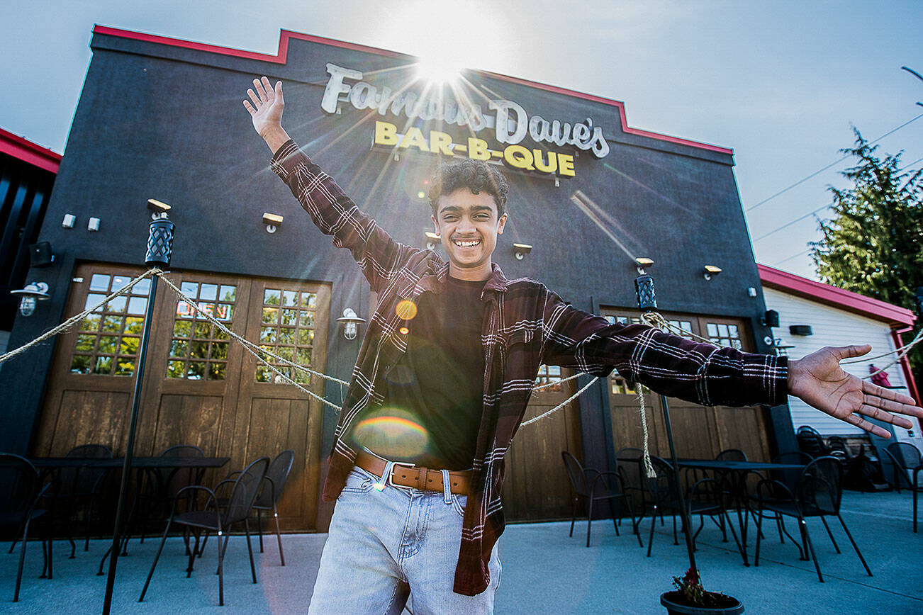 Evan Wiederspohn, a 15 year old from Arlington, who won the blind-judging Put It On The Menu category in a recent BBQ contest hosted by Famous Dave's. His bacon wrapped mac and cheese bites with burnt BBQ ends will go on the appetizer menu in November. (Olivia Vanni / The Herald)