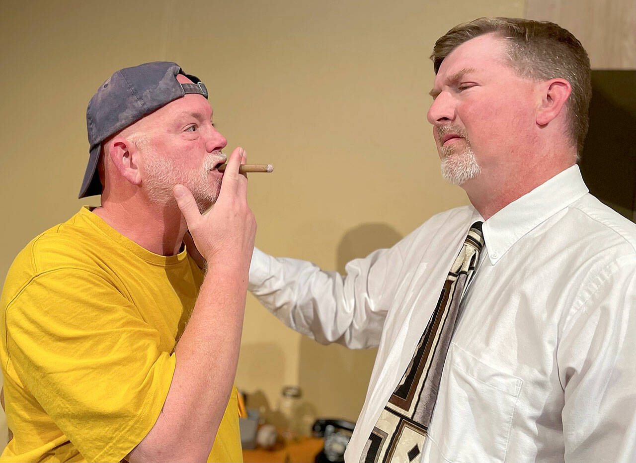 Oscar Madison, played by Joe Goins, left, annoys Felix Unger, portrayed by Thomas A. Glass, in Red Curtain’s production of “The Odd Couple,” showing through Sept. 26 at the Red Curtain Arts Center in Marysville. (Red Curtain)