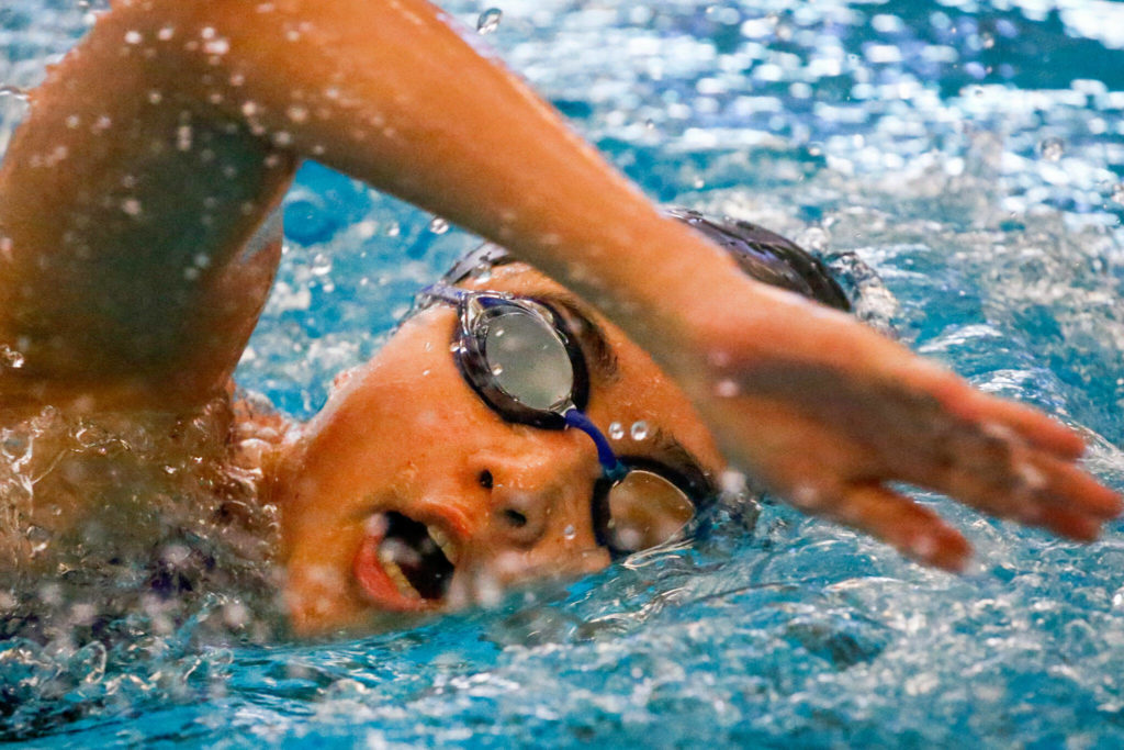 Kamiak’s Janey Ryu competes in the 200 yard freestyle Tuesday afternoon at Kamiak High School in Mukilteo on September 21, 2021. (Kevin Clark / The Herald)
