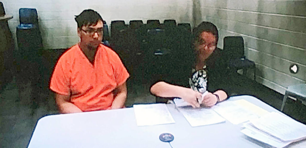Michealob Johnson (left), 25, is accused of killing Jae An at the Food Mart in the 6900 block of Broadway in Everett. (Caleb Hutton / Herald file)
