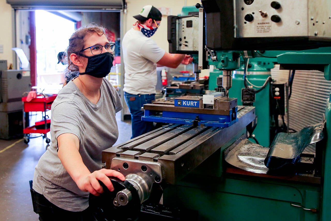 Pamela Propeck works on an assignment at the Advanced Manufacturing Training & Education Center at Everett Community College on June 3, 2020. (Kevin Clark / The Herald file photo)
