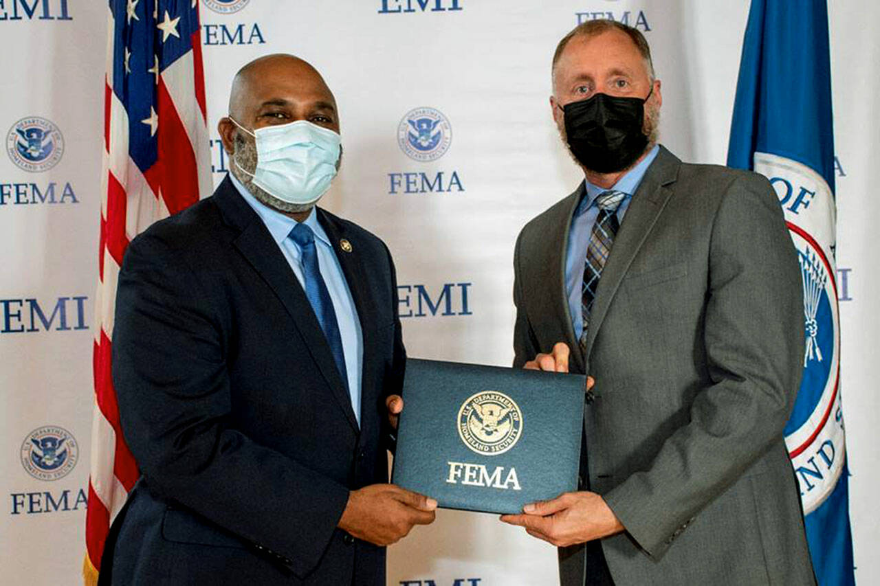 Jason Biermann, right, recently graduated from FEMA’s National Emergency Management Executive Academy. Biermann is Snohomish County’s emergency management director. (Shane Gibbon / FEMA)