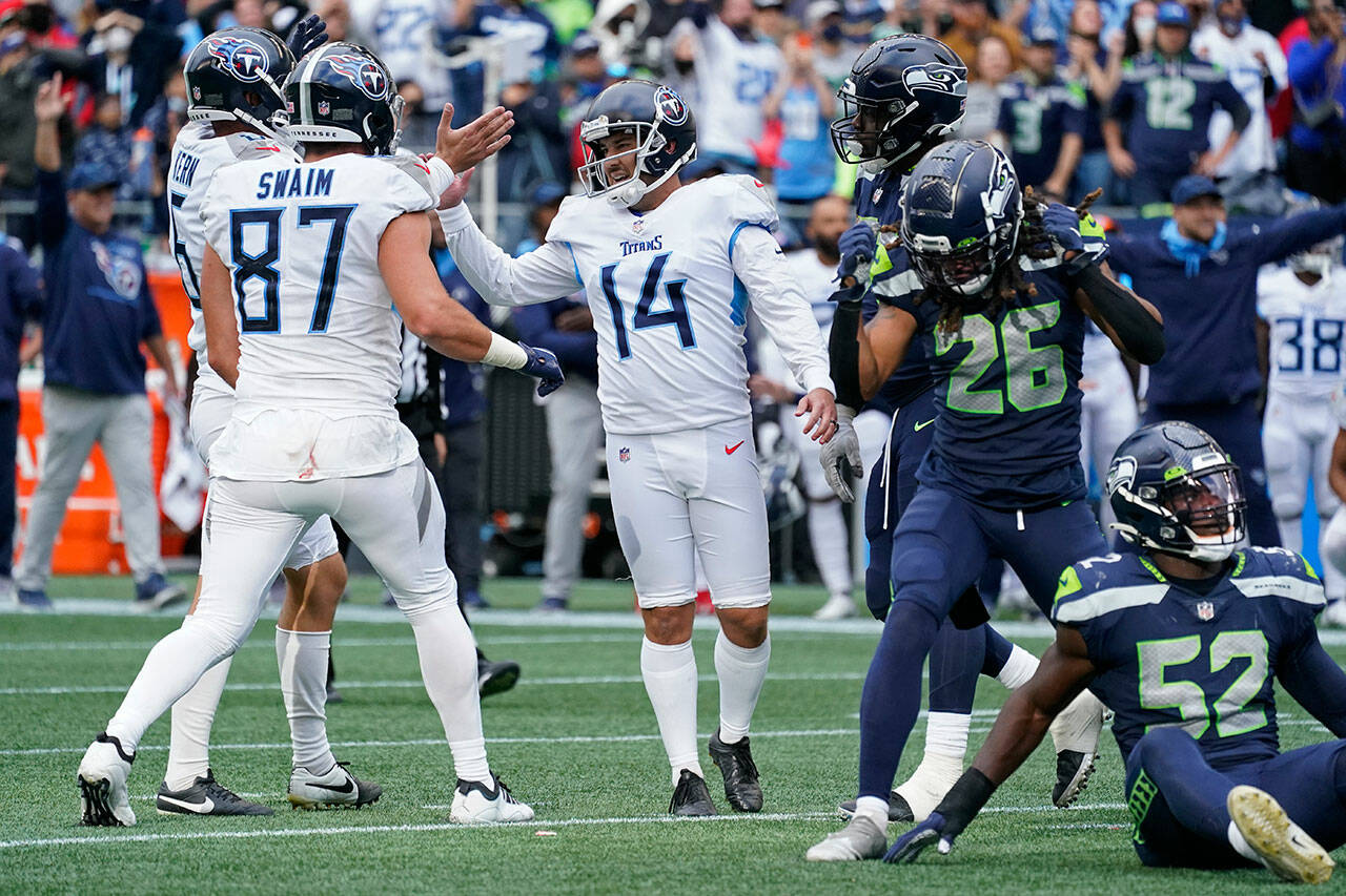 The Seahawks blew a 14-point fourth-quarter lead in their overtime loss to the Titans. The collapse was a joint effort by Seattle’s offense and defense. (AP Photo/Elaine Thompson)