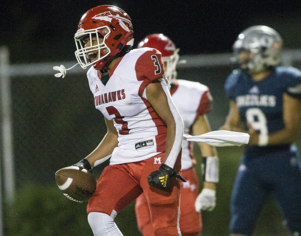Gaylan Gray ran for two touchdowns and added a pick-six while helping Marysville Pilchuck race to a 49-0 third-quarter lead over Glacier Peak last Friday night. (Olivia Vanni / The Herald)
