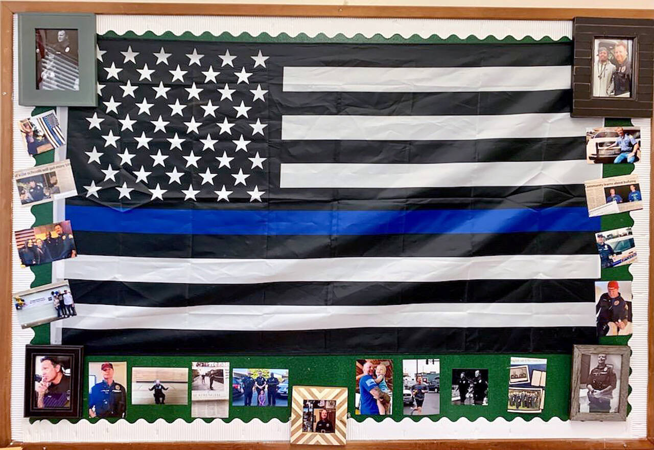 A Marysville Middle School teacher was asked to take down this display, including a Thin Blue Line flag and various images, after school administrators looked into a concern about its political meaning. (Contributed)