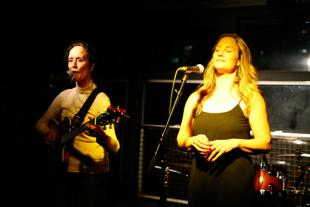 Rejoice (left) and Calm Israel perform at Black Lab Gallery, which now sports a cocktail bar. (Kevin Clark / The Herald)
