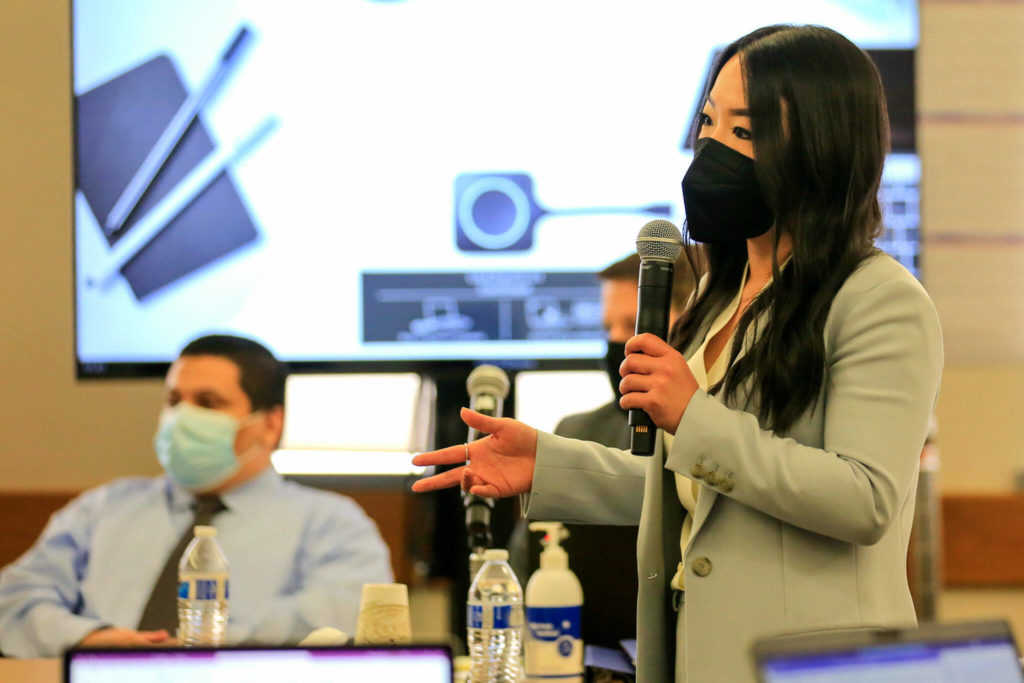 Martina Wong (right), a deputy prosecutor, gives her opening statement to the jury Friday morning during the trial of Jason Dominguez at the Snohomish County Superior Court in Everett on October 1, 2021. (Kevin Clark / The Herald)
