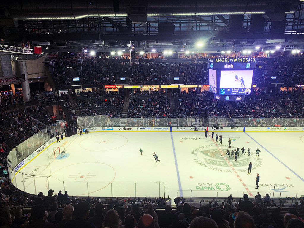 Members of the under-8 youth Silvertips squad try to score in a shootout on the NHL ice. (Jake Goldstein-Street / The Herald)
