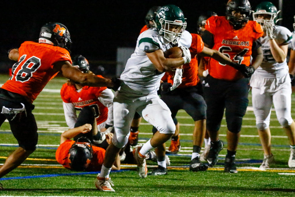 Edmonds-Woodway’s Aaron Barraza rushes for the goal line a touchdown Friday night at Monroe High School on October 1, 2021. (Kevin Clark / The Herald)
