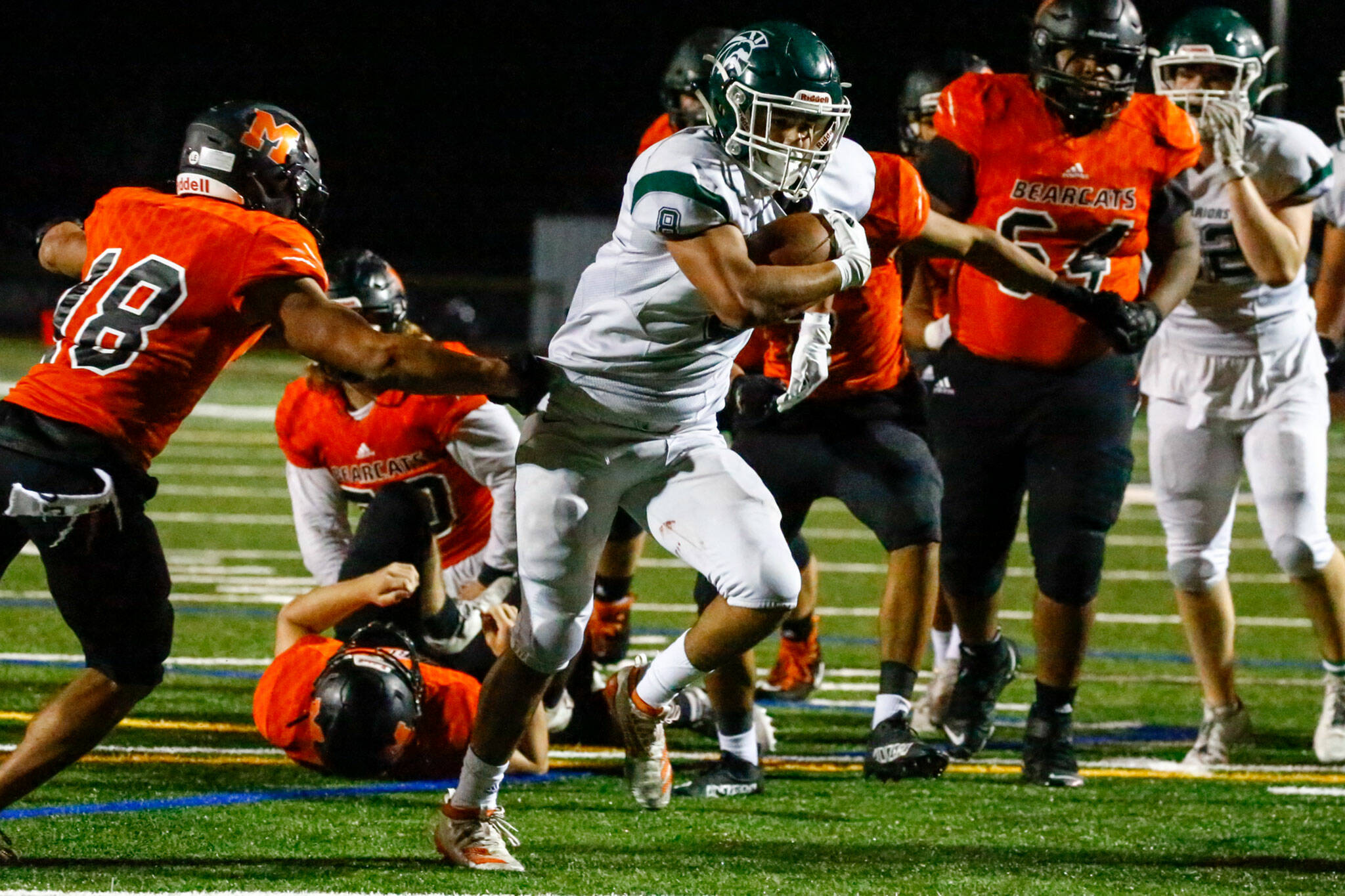 Edmonds-Woodway senior running back Aaron Barraza had a breakout performance in the Warriors’ 33-28 win over Monroe last Friday night. (Kevin Clark / The Herald)