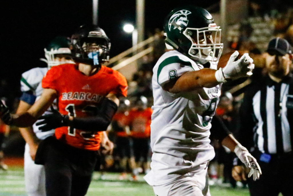 Aaron Barraza lifted Edmonds-Woodway past Monroe with 197 yards rushing and four touchdowns. (Kevin Clark / The Herald)
