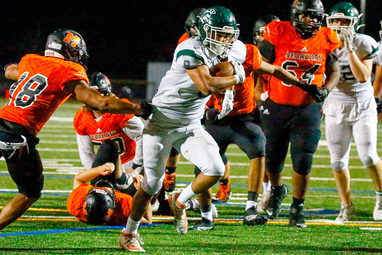 Edmonds-Woodway's Aaron Barraza rushes for the goal line a touchdown Friday night at Monroe High School on October 1, 2021.   (Kevin Clark / The Herald)