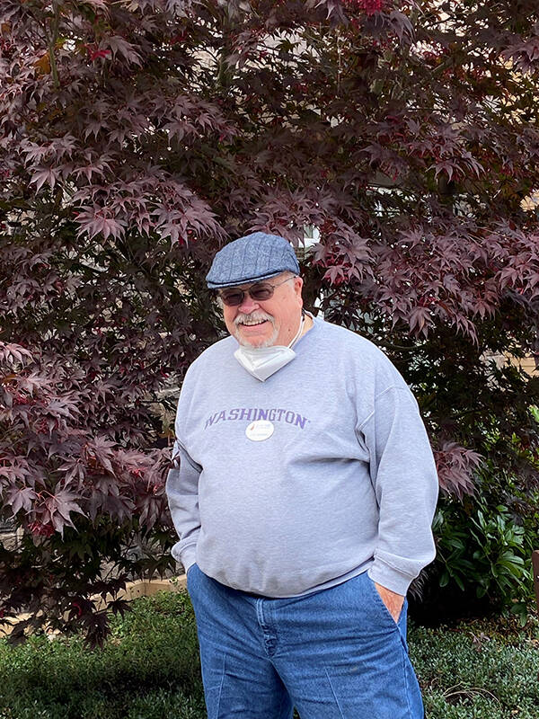 Quail Park of Lynnwood resident Gary Hoskins takes in some of the gorgeous fall colors brightening up the garden.