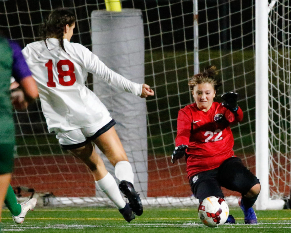 Edmonds-Woodway’s Merideth Eldridge blocks a shot at goal from Snohomish’s Sophia Andre Thursday night at Edmonds-Woodway High School in Edmonds on October 7, 2021. (Kevin Clark / The Herald)
