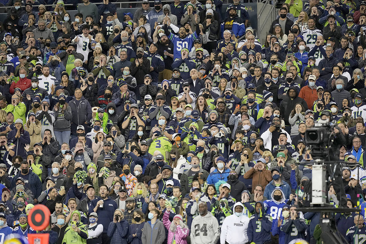 Fans fill Lumen Field during the Seattle Seahawks game against the Los Angeles Rams on Oct. 7 in Seattle. Starting Nov. 15, people in Washington state will need to either provide proof of COVID-19 vaccination or a negative test in order to attend large events. (AP Photo/Ben VanHouten, file)