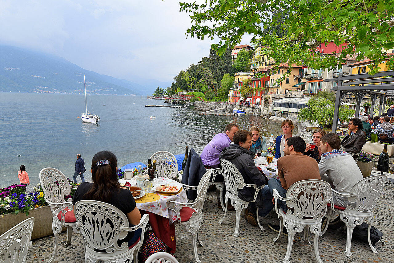 Romantic lakeside dining in Varenna, on the shore of Lago di Como in Italy. (Rick Steves’ Europe)