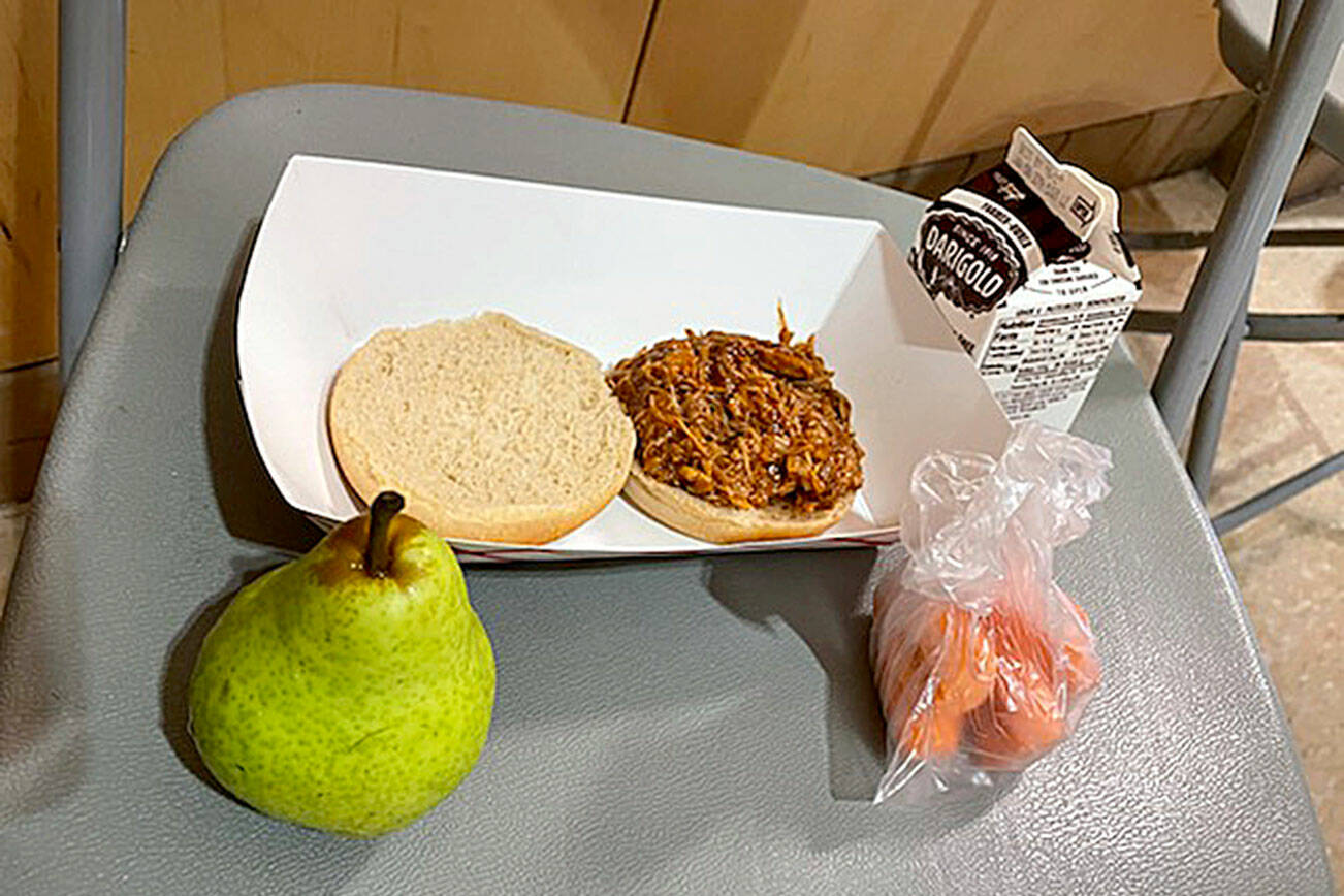 School meals, like this sloppy Joe, chocolate milk, pear and baby carrots, support kids and local farmers. (Jennifer Bardsley)