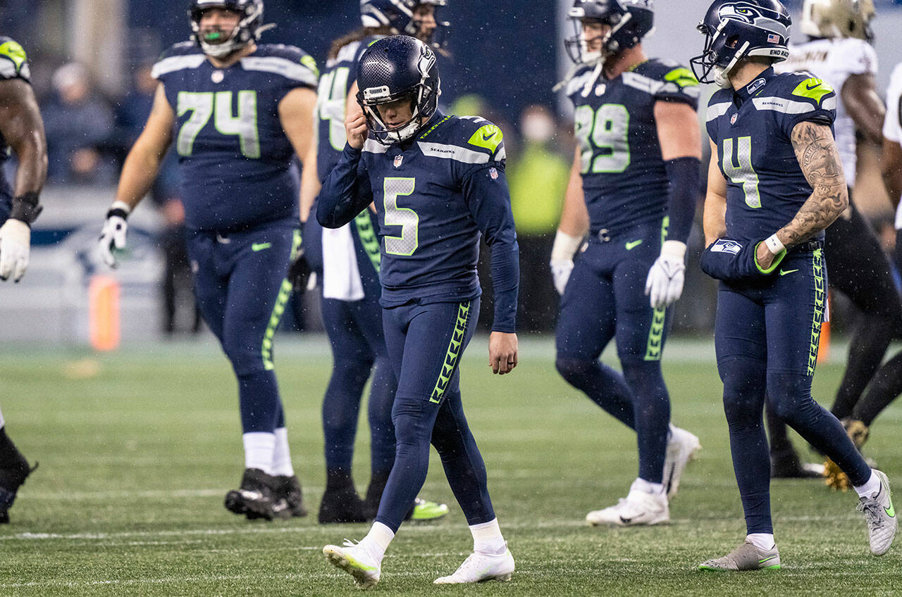 Seattle Seahawks kicker Jason Myers (5) walks off the field after missing a field goal during the second half of a game against the New Orleans Saints on Monday in Seattle. The Saints won 13-10. (AP Photo/Stephen Brashear)