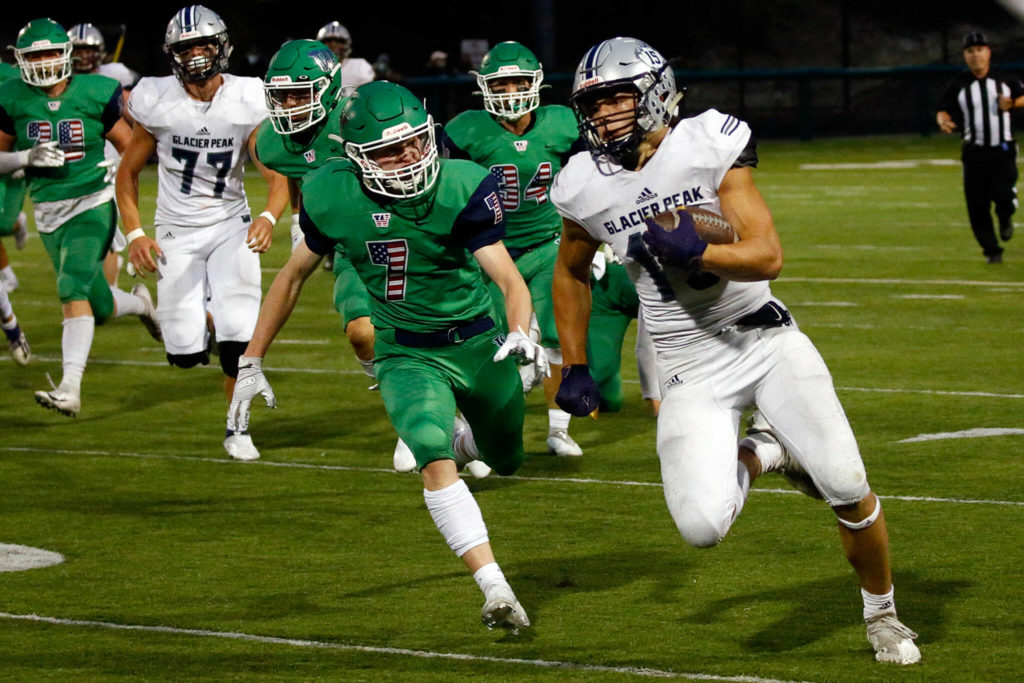 Trey Leckner and Glacier Peak look to end Lake Stevens’ streak of seven consecutive Wesco 4A titles. (Kevin Clark / The Herald)
