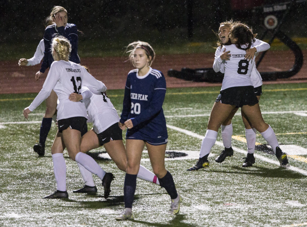 Jackson players celebrate their victory after the final whistle is blown. (Olivia Vanni / The Herald)
