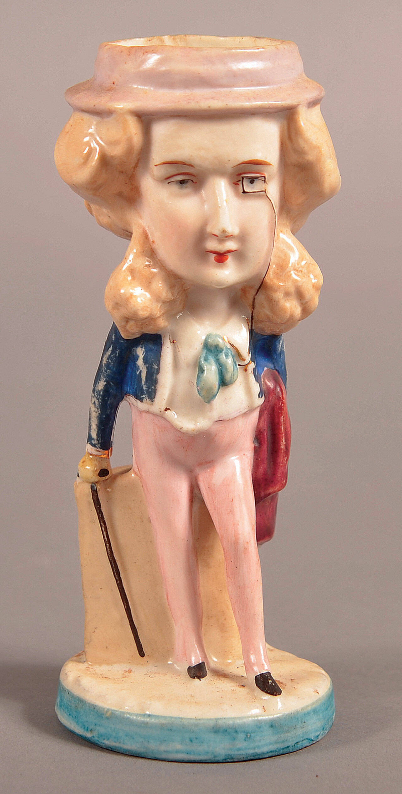 This fanciful bisque match holder made to look like a man sold for $59 at Conestoga Auction. A recognizable caricature of a known person would have a higher value. (Cowles Syndicate Inc.)