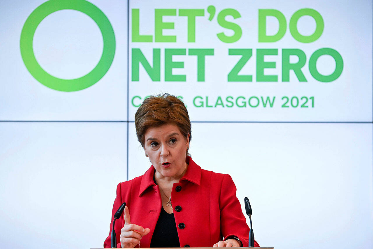 Scotland’s First Minister Nicola Sturgeon delivers a keynote speech in the Technology and Innovation Centre during a visit to the University of Strathclyde, Glasgow, ahead of the United Nations COP26 climate conference, in Scotland, Oct. 25. (Jeff J Mitchell / Associated Press)