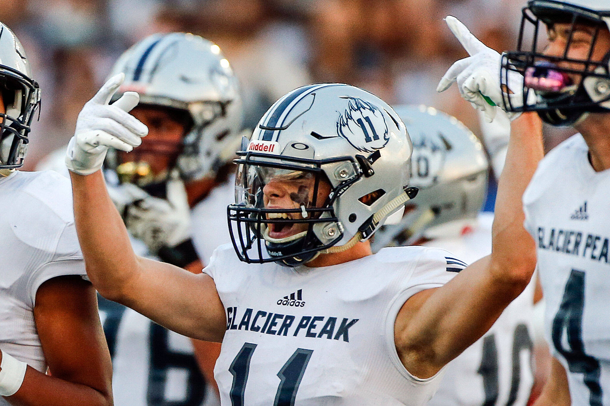 Glacier Peak’s Jadon Claps celebrates a defensive stop against Snohomish during a game on Sept. 3, 2021, at Veteran’s Memorial Stadium in Snohomish. (Kevin Clark / The Herald)