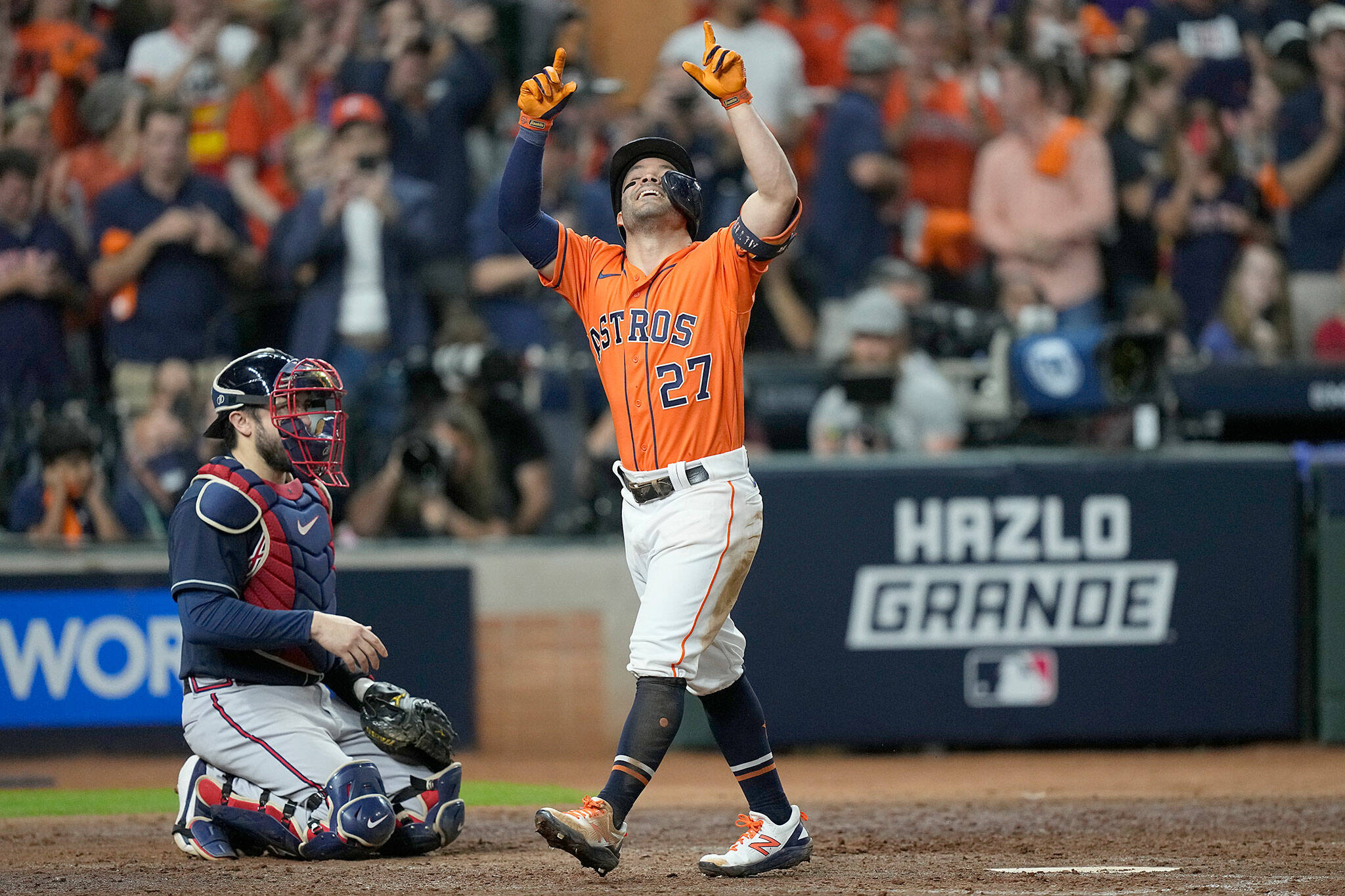 The Astros’ Jose Altuve celebrates after a home run during the seventh inning of Game 2 of the World Series against the Braves on Oct. 27, 2021, in Houston. (AP Photo/David J. Phillip)