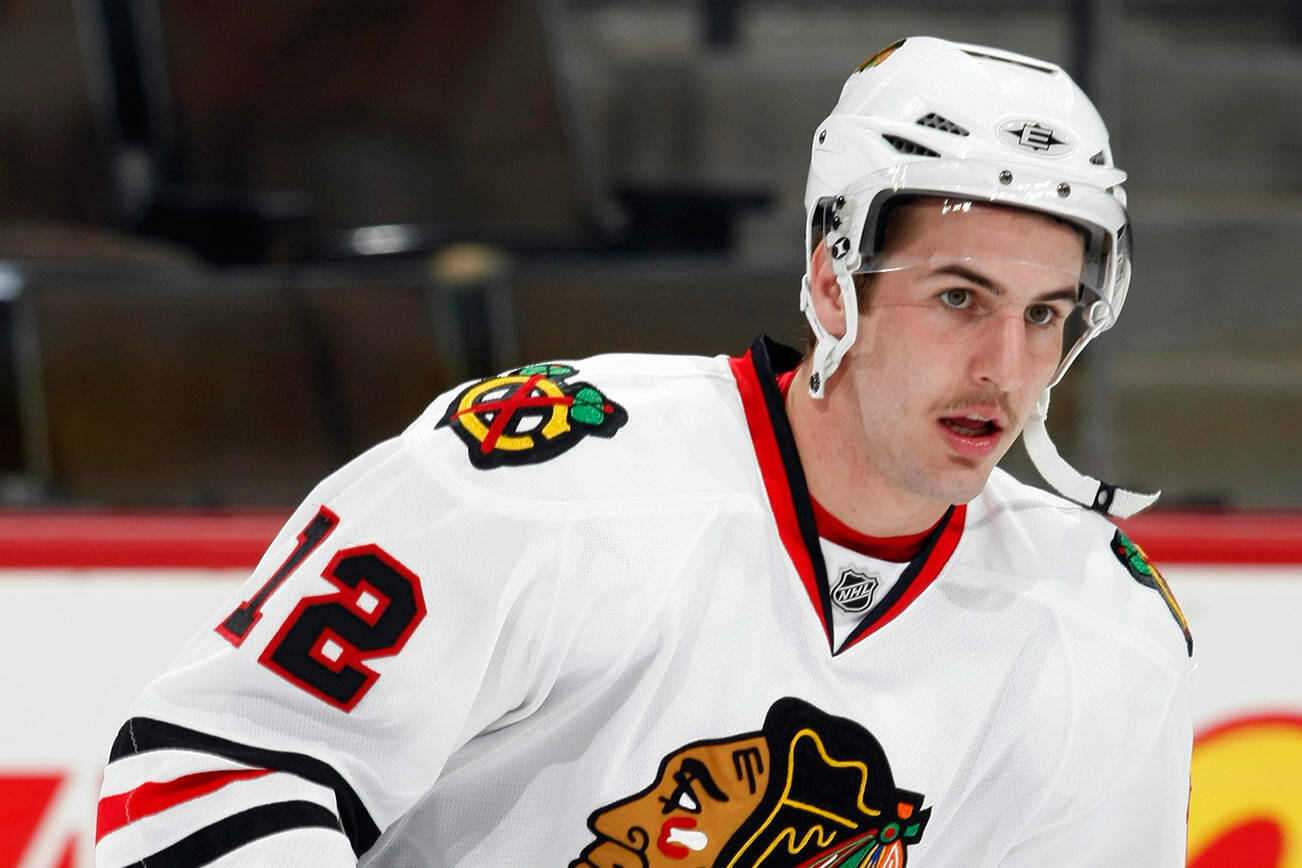 Chicago Blackhawks left winger Kyle Beach warms up before facing the Colorado Avalanche in an NHL exhibition hockey game in Denver on Friday, Oct. 3, 2008. (AP Photo/David Zalubowski)