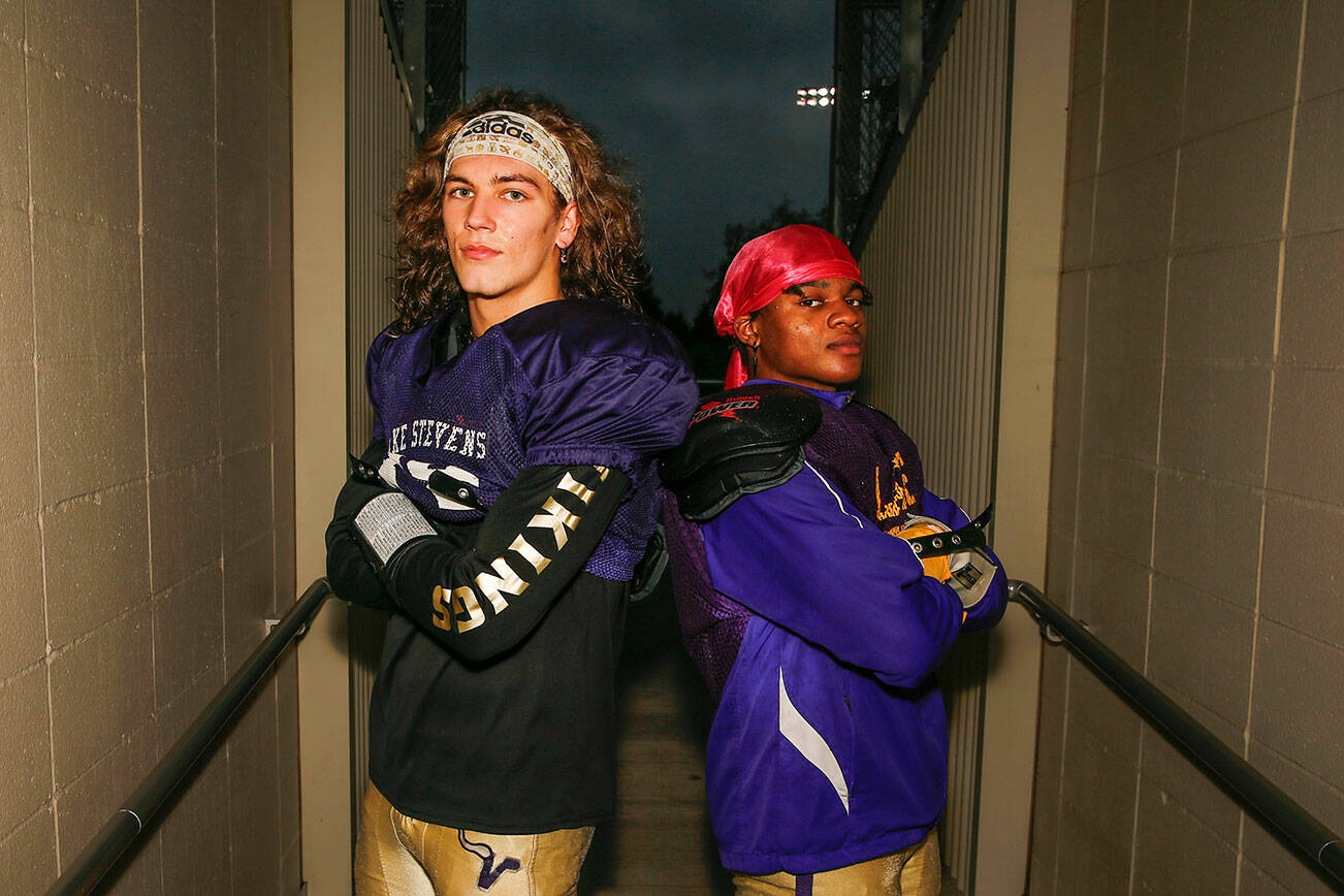Duo of two-way senior standouts Drew Carter, left, and Trayce Hanks Thursday evening during practice at Lake Stevens on October 28, 2021. (Kevin Clark / The Herald)