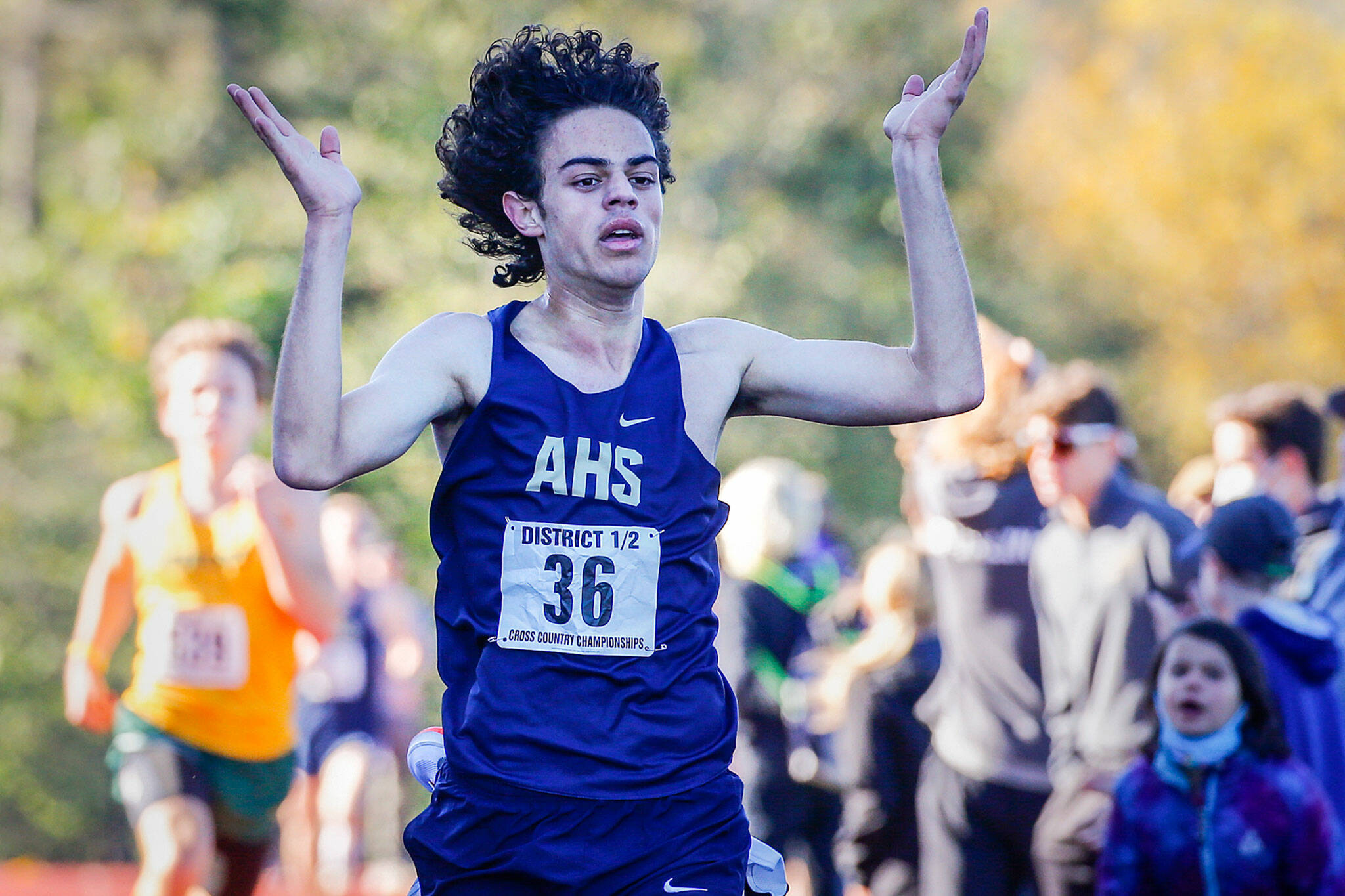 Arlington's Brandon Moore finishes first in Saturday afternoon during the 3A District 1 Cross Country Championships at Lakewood High School in Arlington on October 30, 2021. (Kevin Clark / The Herald)