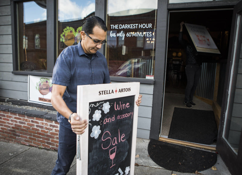 Double Barrel Wine Bar and Lounge owner Lionel Madriz outside his business in Snohomish. (Olivia Vanni / The Herald)
