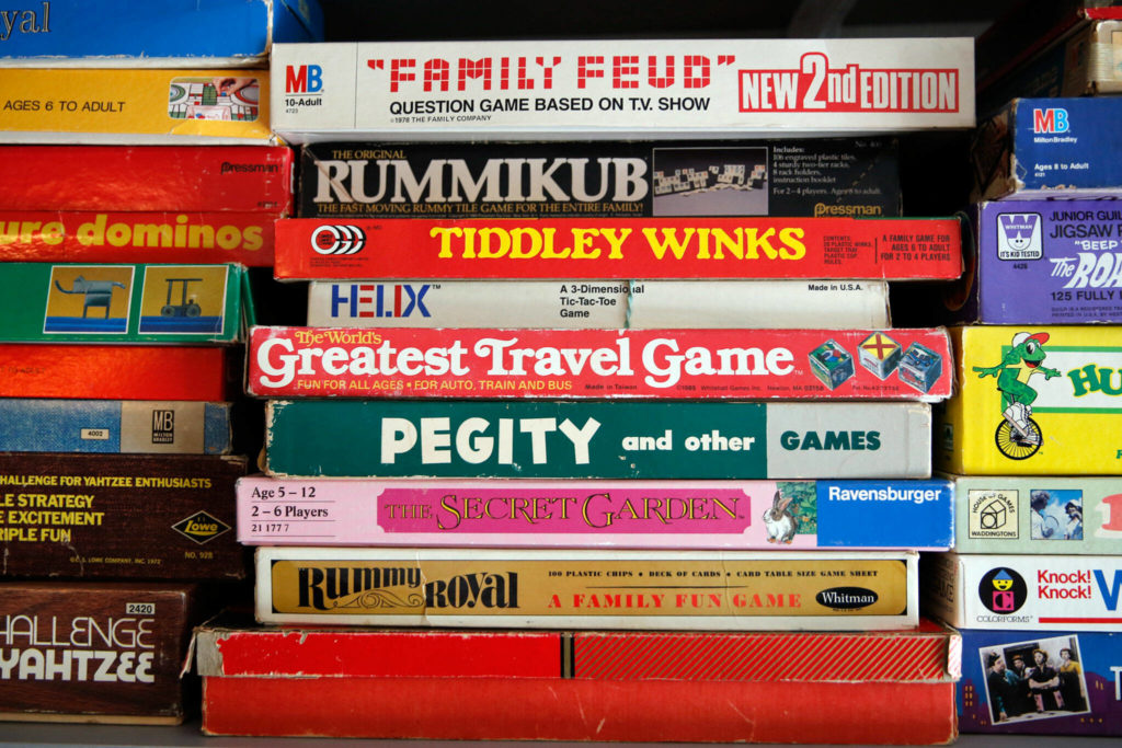Some of the hundreds of boardgames that fill Bonnie Hertzog’s home. (Kevin Clark / The Herald)
