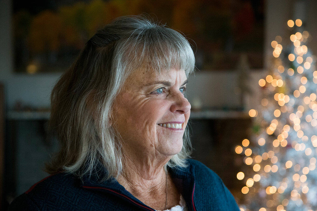 Patt Bass at her home on Wednesday, Nov. 3, 2021 in Camano Island, Washington. Bass survived a "massive stroke" and almost a week later was out golfing, thanks to the work of Providence doctors. Providence started its 24/7 thrombectomy program in January. (Andy Bronson / The Herald)