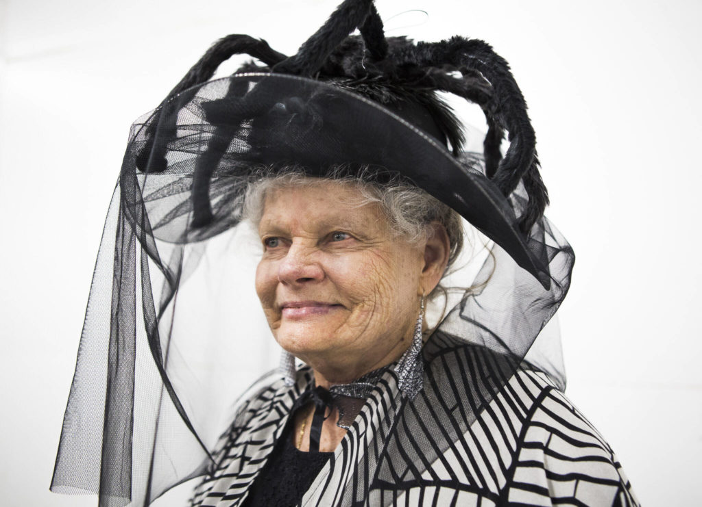 Catherine Justice, dressed in a spider-themed outfit, poses for a portrait at the last Oddmall Emporium of the Weird in 2019 in Monroe. (Olivia Vanni / Herald file) 
