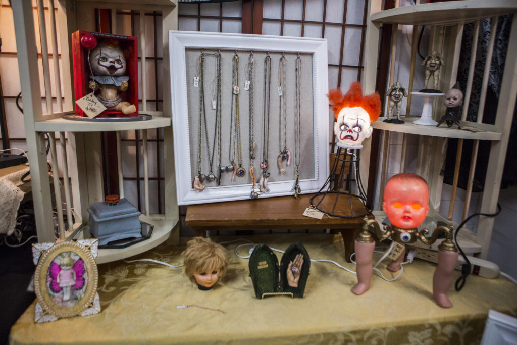 Small doll heads, doll parts and unique doll figurines created by Crooksy Creations at the last Oddmall Emporium of the Weird in 2019 in Monroe. (Olivia Vanni / Herald file)
