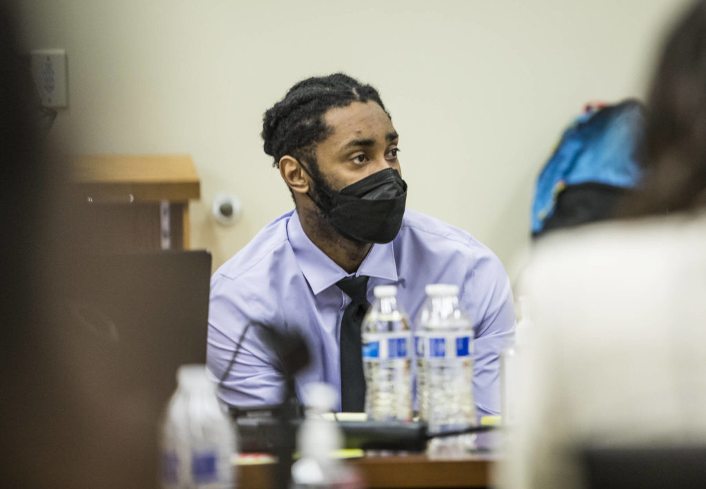 Kevin Lewis listens to Abigail Ruggles’ testimony during his trial Wednesday in Everett. (Olivia Vanni / The Herald)
