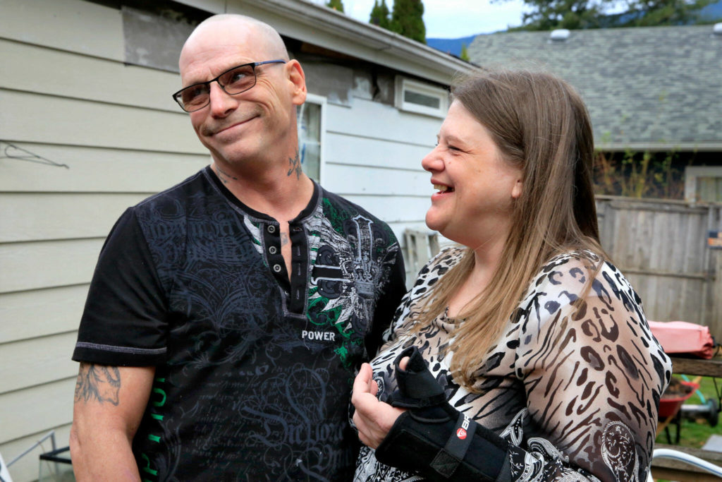 Twyla Kill with her husband, Terry Kill, at their home in Gold Bar. (Kevin Clark / The Herald) 
