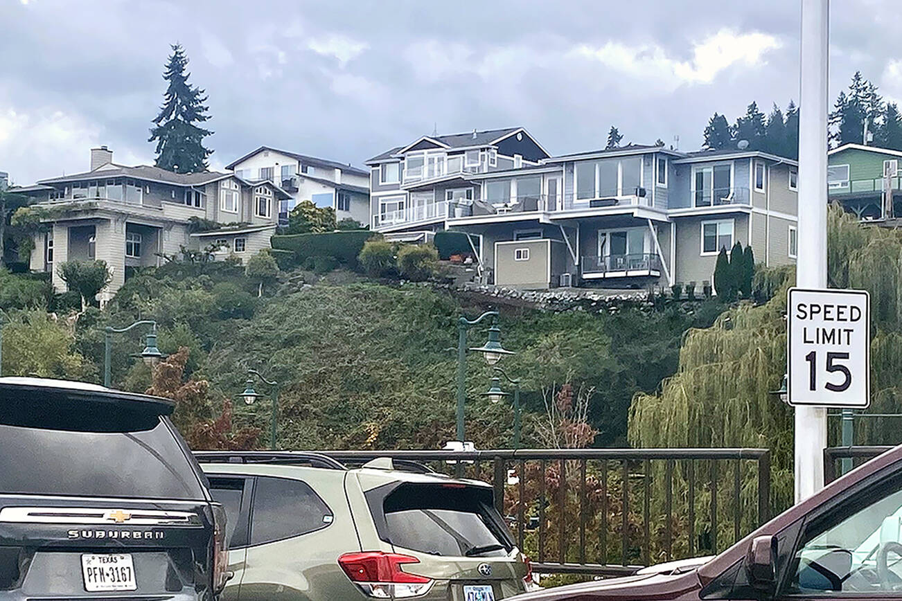 Hillside homes in Mukilteo are seen from the ferry line on Oct. 20. (Andrea Brown / The Herald)