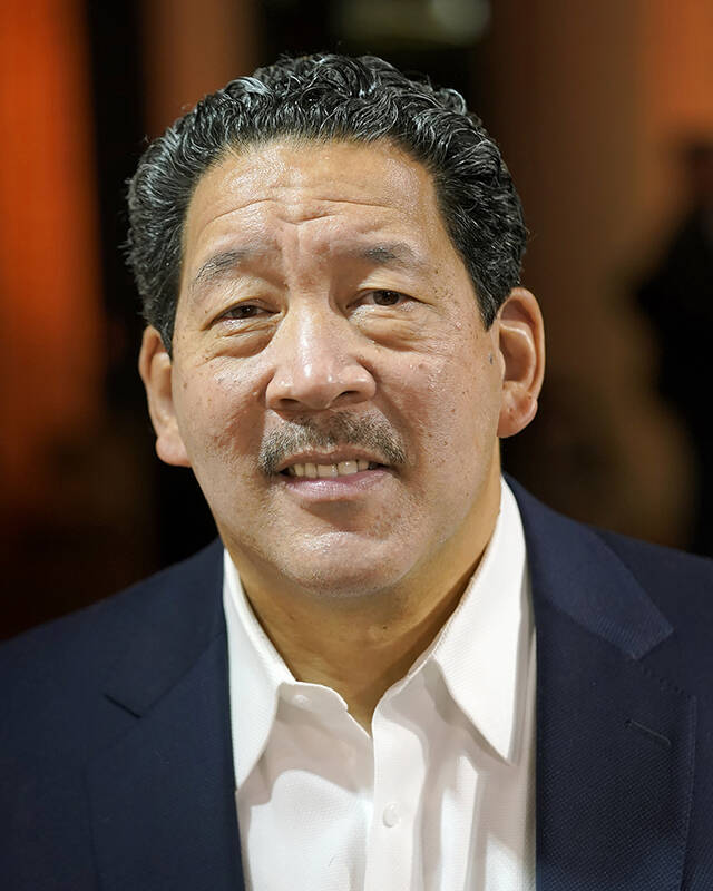 Bruce Harrell, who ran against Lorena Gonzalez in the race for mayor of Seattle, poses for a photo Tuesday at his election night gathering in Seattle. (AP Photo/Ted S. Warren)