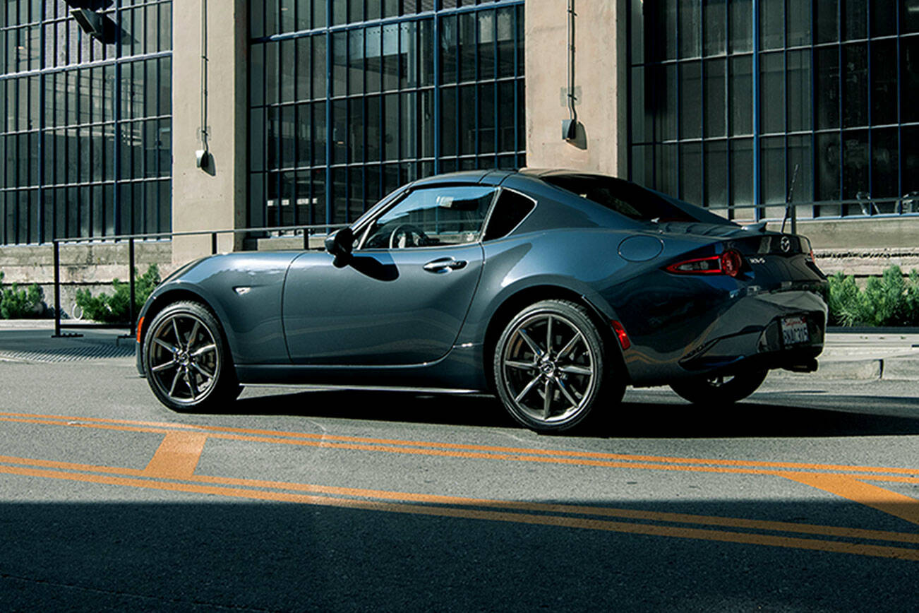 The 2021 Mazda MX-5 Miata is available as a soft-top convertible or the power-folding hard-top model shown here. (Manufacturer photo)