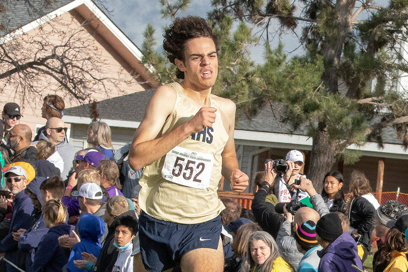 Arlington’s Brandon Moore (552), competes in the WIAA state 3A boys cross country tournament on Saturday, Nov. 6, 2021, at Sun Willows Golf Course in Pasco, Wash. (TJ Mullinax/for The Herald)