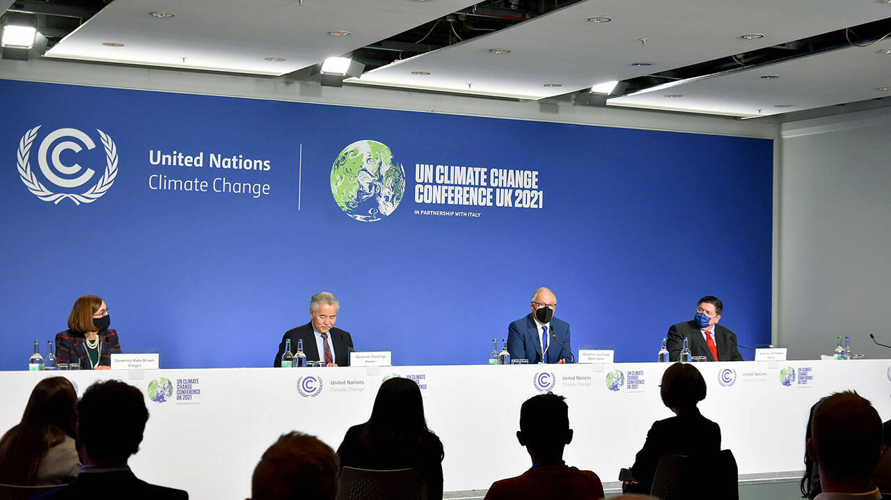 Gov. Jay Inslee joined other governors Monday at the Climate Registry Climate Action Reserve press conference in Glasgow, Scotland, to talk about climate achievements and goals. From left, Oregon Gov. Kate Brown, Hawaii Gov. David Ige, Gov. Jay Inslee and Illinois Gov. J.B. Pritzker. (Gov. Jay Inslee)