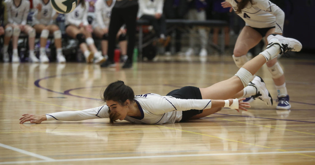 Lake Stevens’ Hayli Tri lays out for the dig as Lake Stevens beat Mount Si in five sets in a Class 4A Wes-King Bi-District tournament semifinal volleyball matchup Tuesday in Lake Stevens. (Andy Bronson / The Herald)
