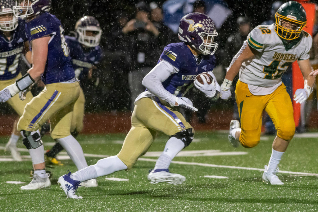 Lake Stevens running back Jayden Limar carries the ball during a 4A state playoff game against Richland on Saturday, Nov. 13, 2021 in Lake Stevens. (John Gardner / Pro Action Image)
