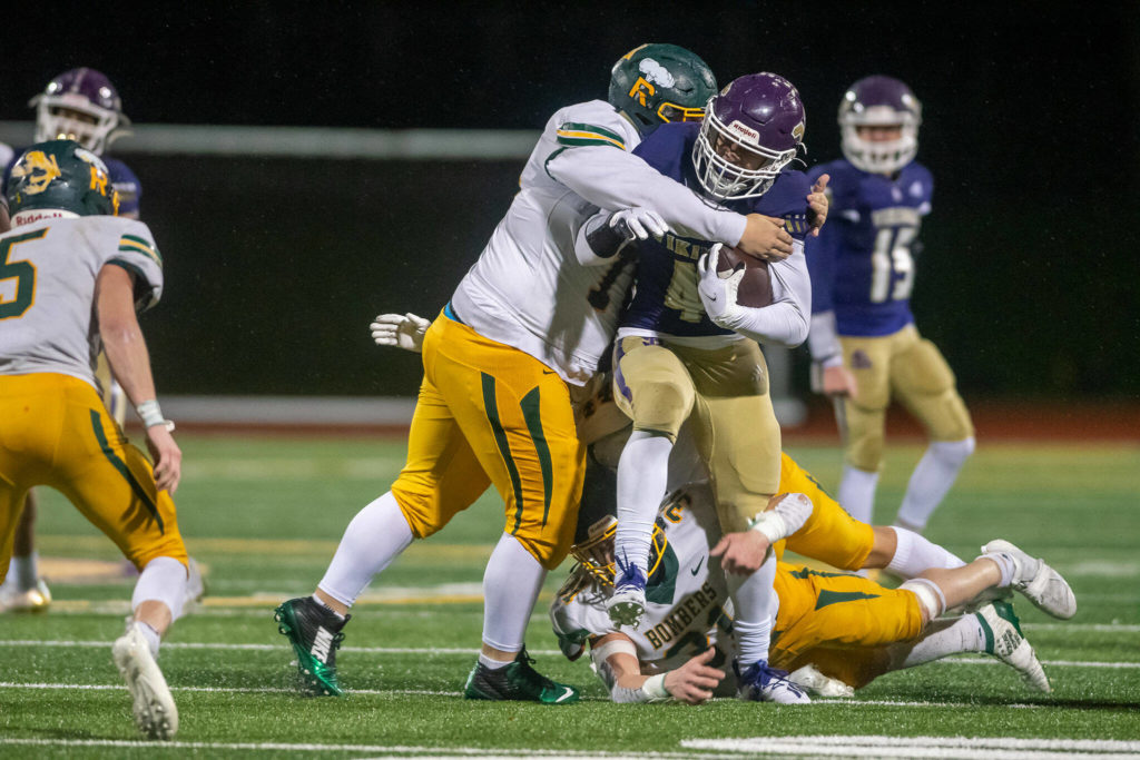 Lake Stevens running back Jayshon Limar carries the ball during a 4A state playoff game against Richland on Saturday, Nov. 13, 2021 in Lake Stevens. (John Gardner / Pro Action Image)
